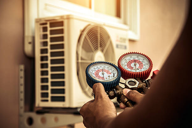Professional Heat Pump Repair technician working in Ruby, NY